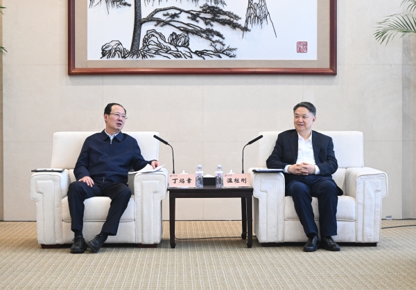 丁焰章與中國華能董事長、黨組書記溫樞剛會談
